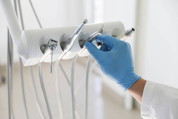 Professional Tooth Extraction technician working in Corsicana, TX